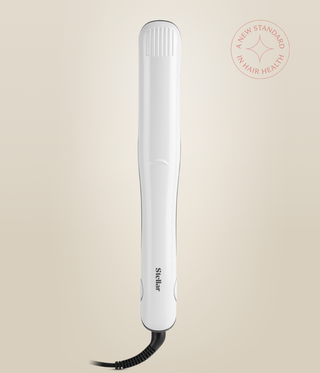 Front view of the closed Pearl White Omnia Styler Plus with Stellar logo and cord.