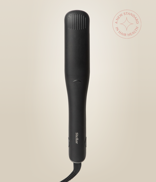 Front view of the closed Astral Black Omnia Styler Max, with Stellar logo and cord.